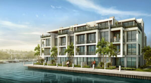 Macken Companies Tops off Construction on Koya Bay Luxury Waterfront Townhome Development